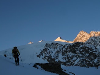 Heading up the Ried glacier, with Nadelgrat in the morning sun.jpg